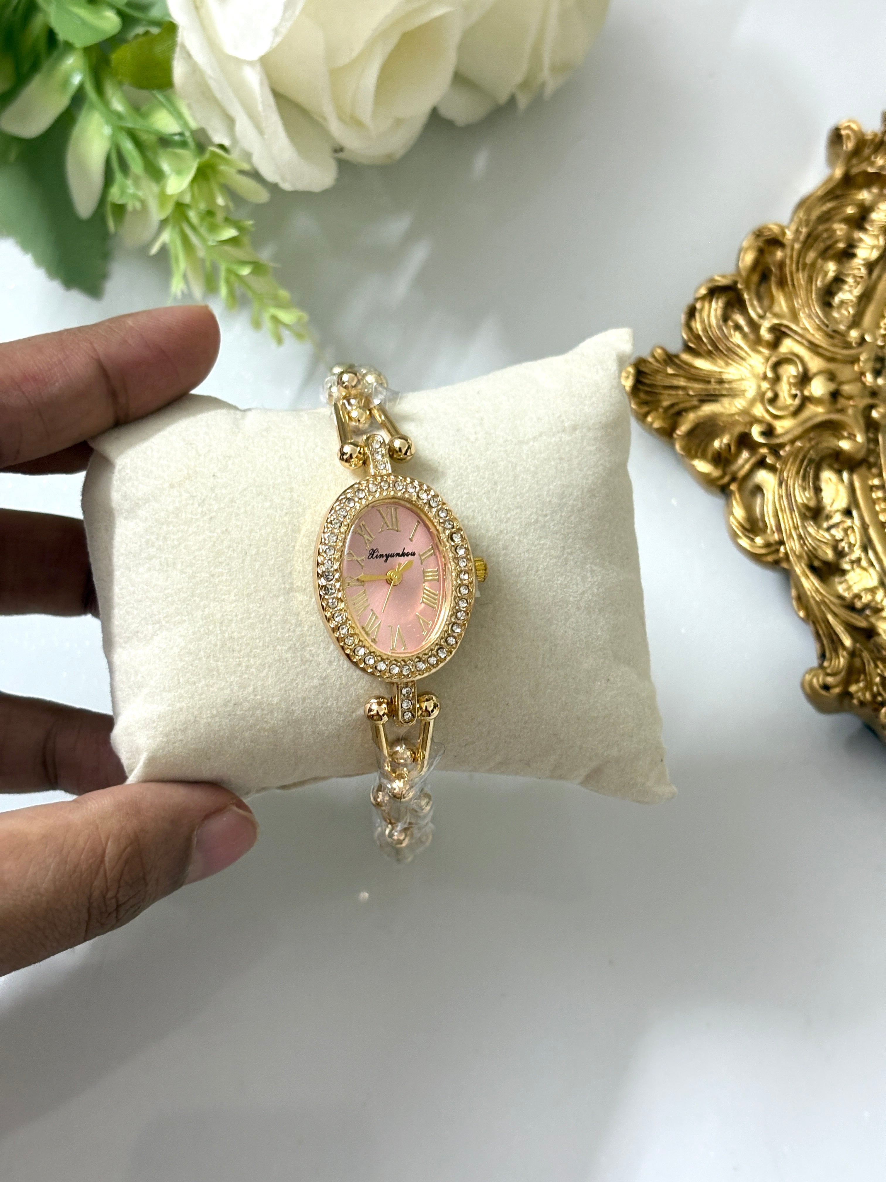 Pink stone watch